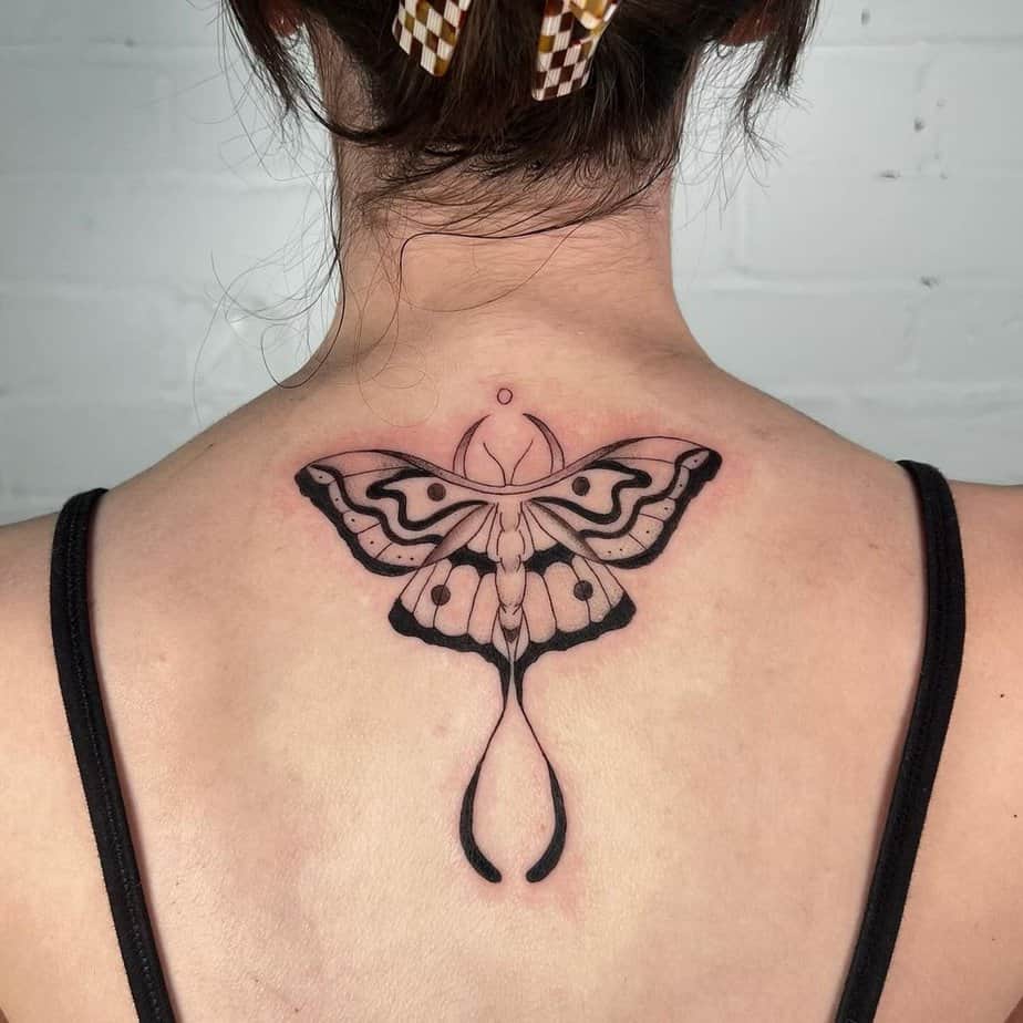 13. A Luna moth trap tattoo
