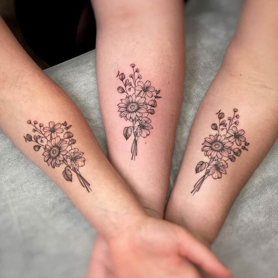 9. A matching floral tattoo featuring a jasmine flower
