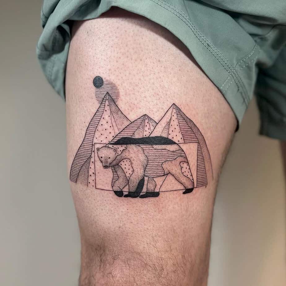 9. A mountain tattoo on the thigh
