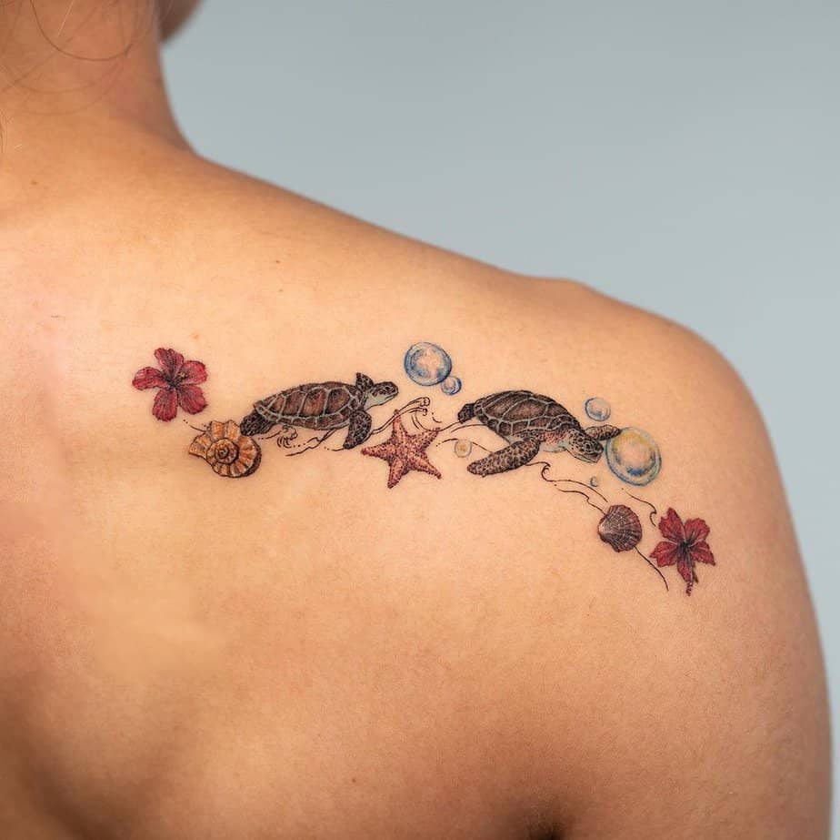 16. A sea-themed shoulder tattoo
