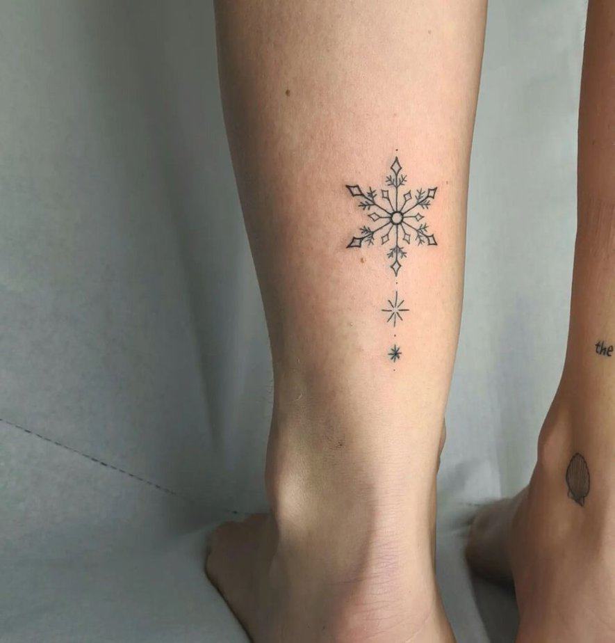 A snowflake and sparkles