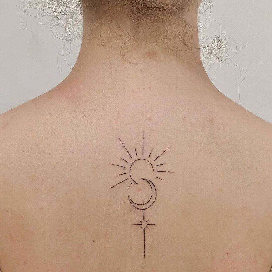 A sun and moon back tattoo