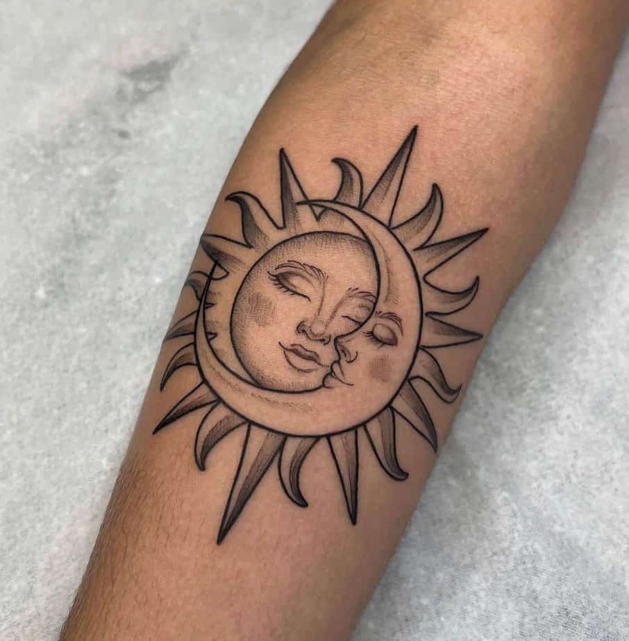 A sun and moon tattoo with a face