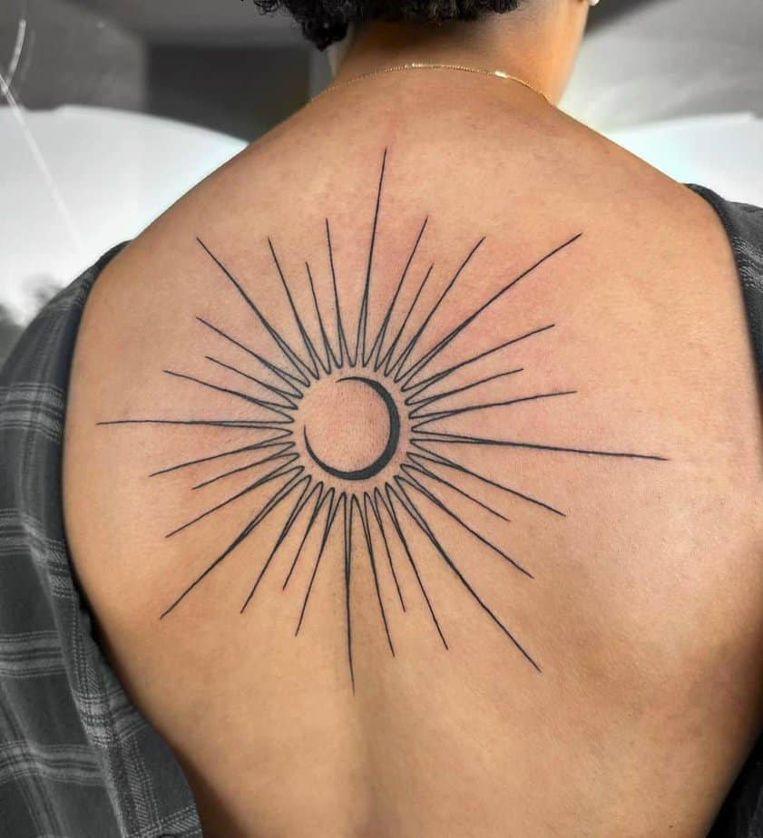 19. A sun and moon trap tattoo
