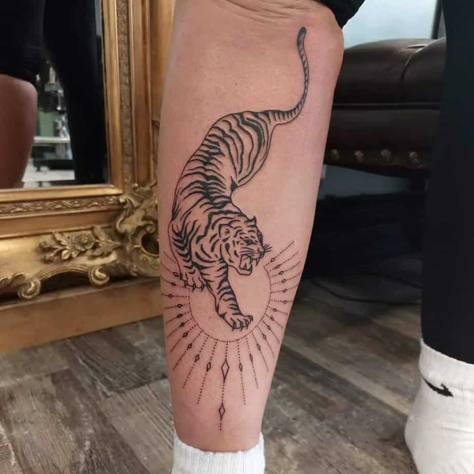 A tiger tattoo on the shin