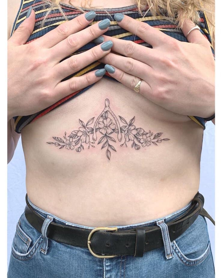 A wishbone sternum tattoo