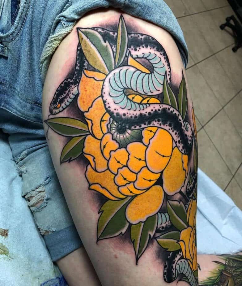 Japanese-style snake and flowers tattoo