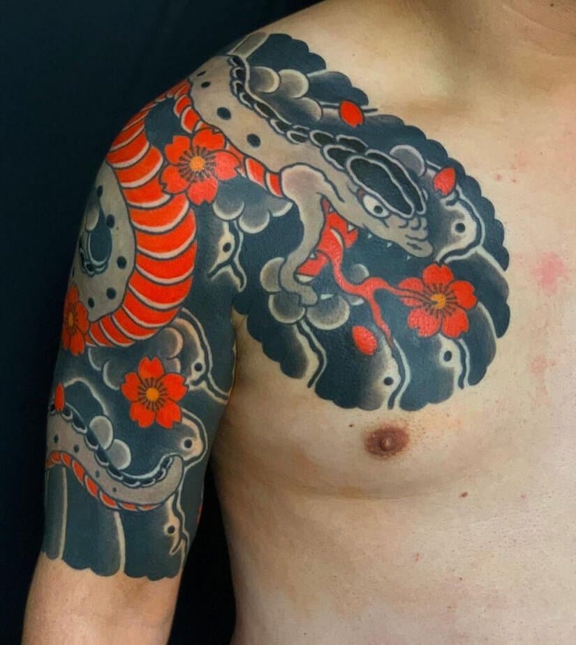 Japanese-style snake and flowers tattoo