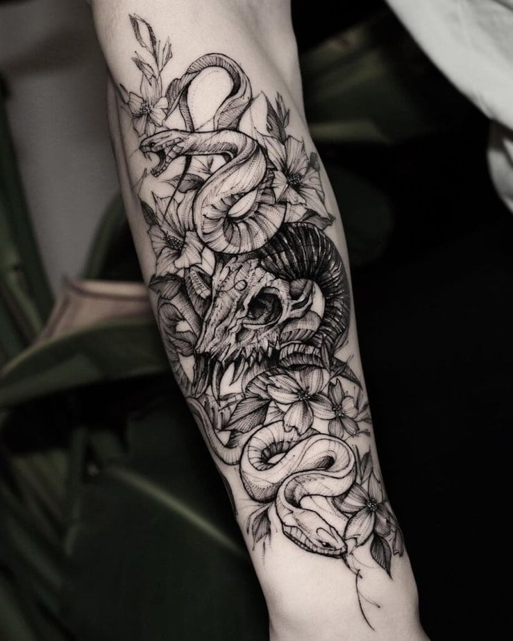 Floral snake bracelet tattoo