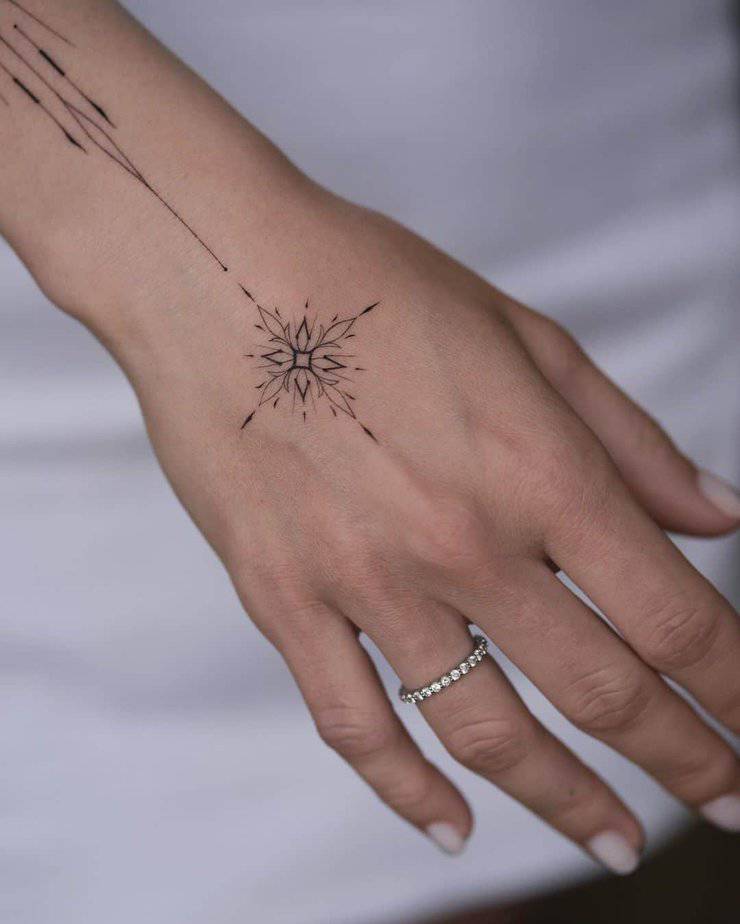 Another tattoo of an ornament on the hand