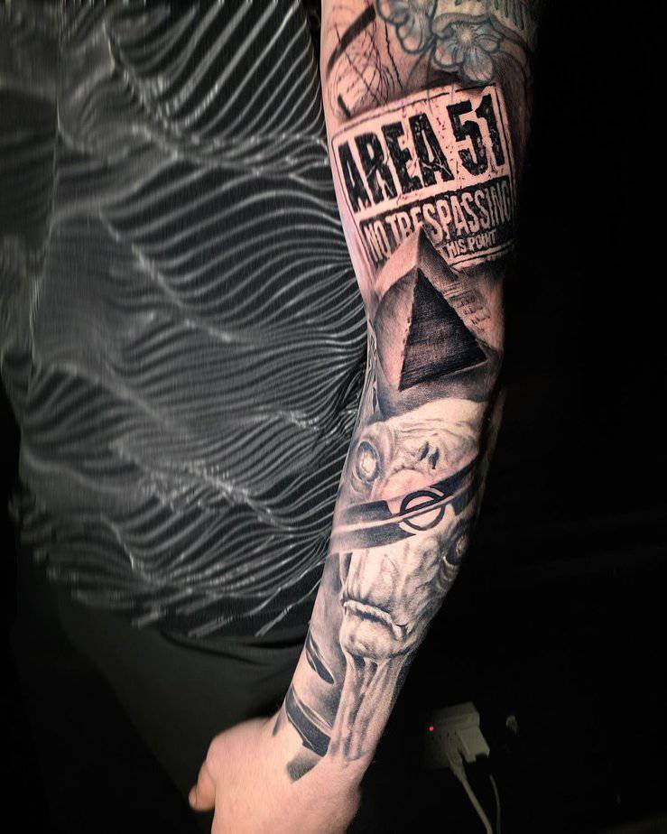 9. Area 51 street tattoo on the arm
