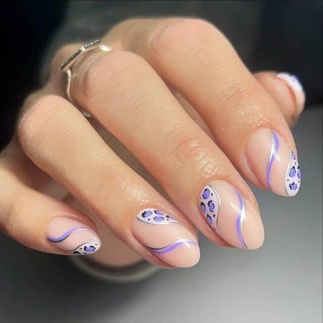 Beautiful purple animal print nails