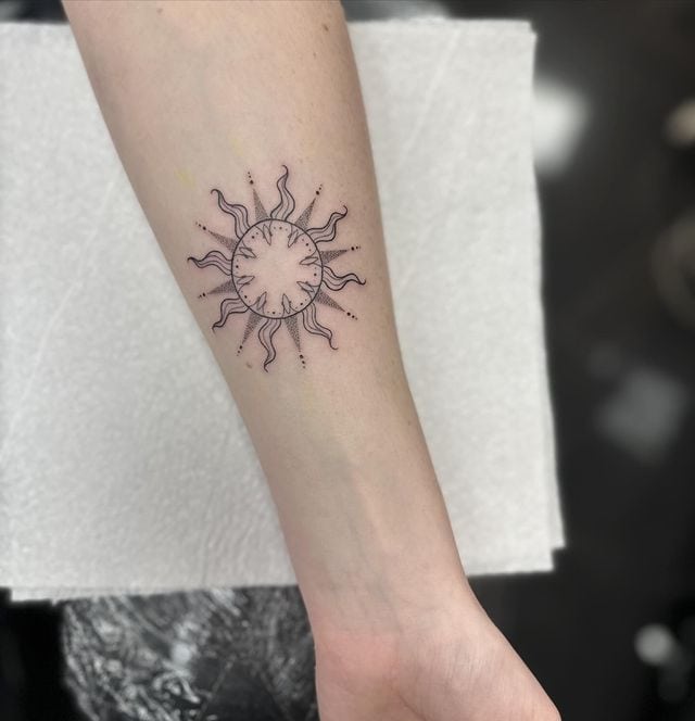 Cute little sun tattoo