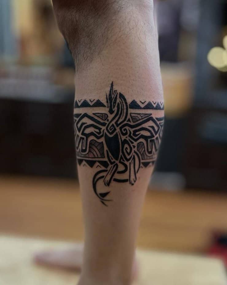 14. Maori dragon motif on the calf