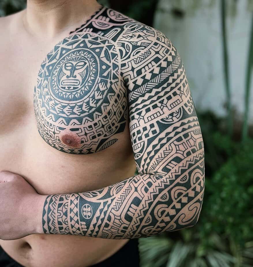 7. A chest Maori tattoo to wear with pride