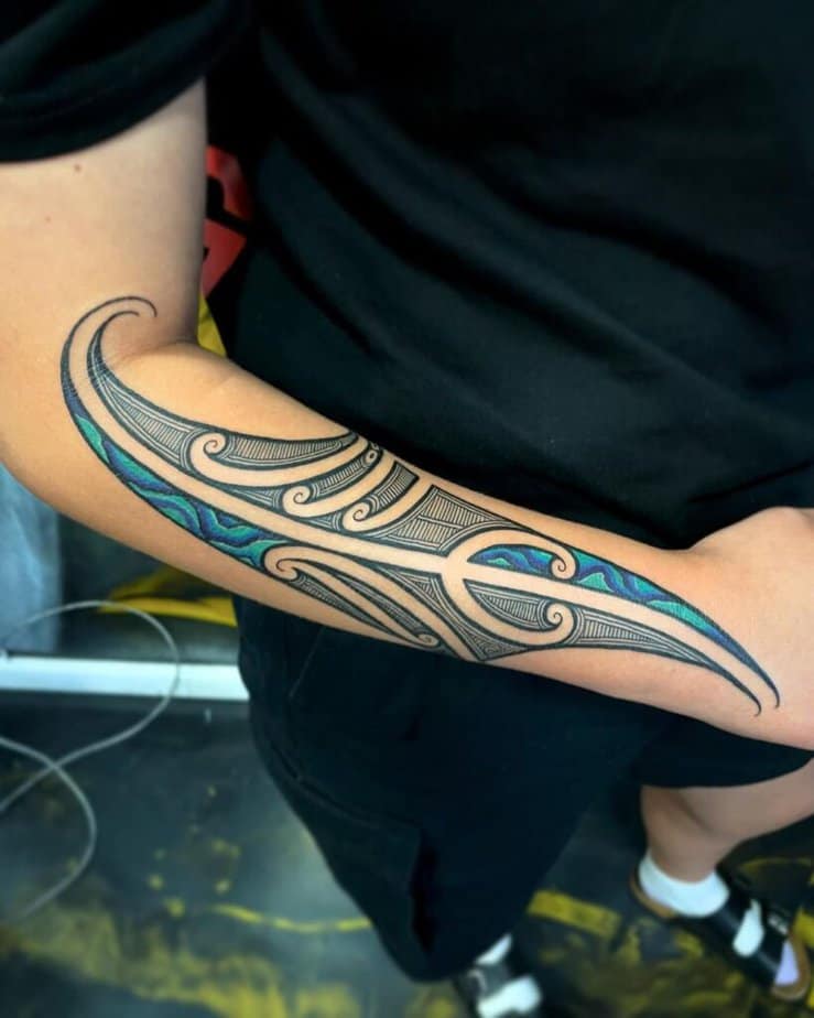 8. Incredible Maori forearm tattoo