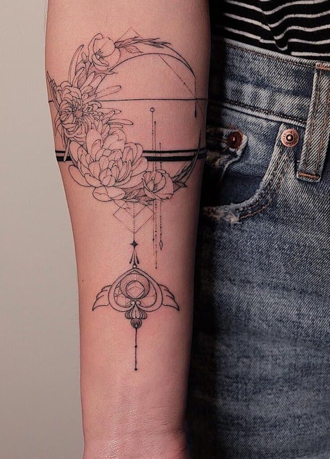 Floral tattoo with anime imagery