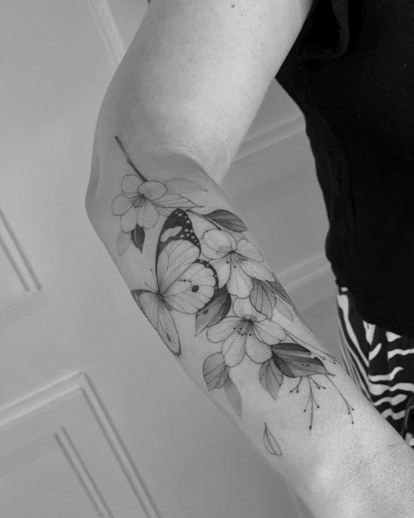 Floral tattoo with butterflies