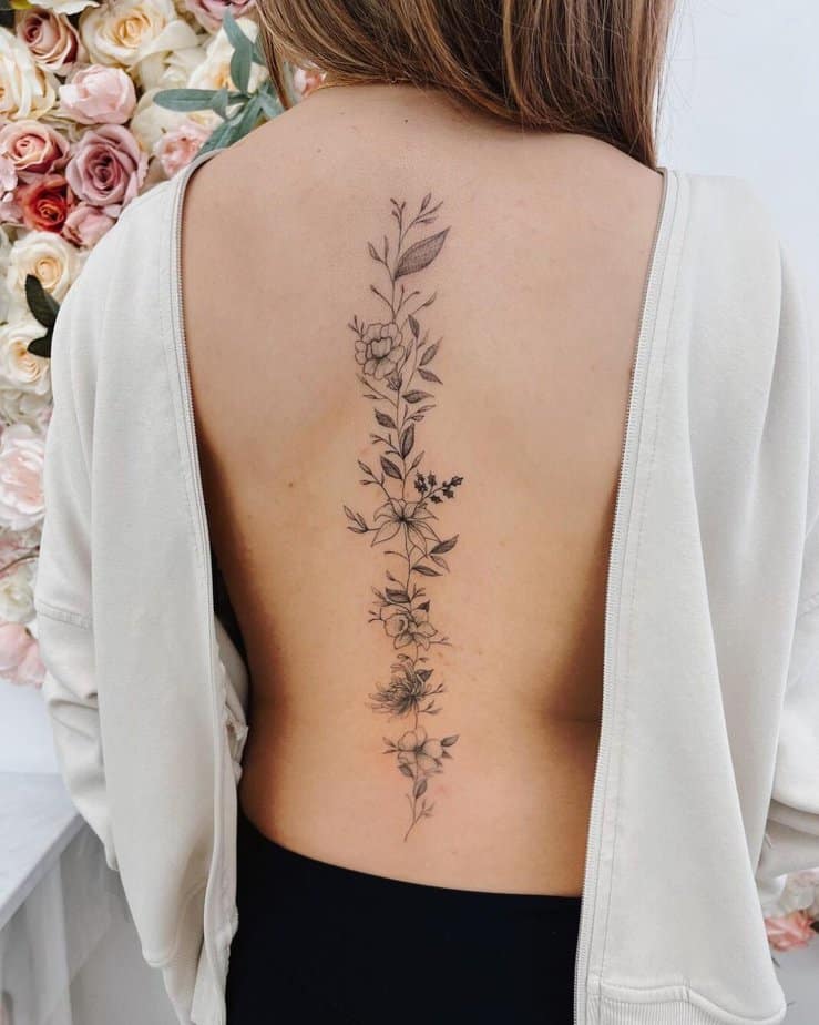 Floral vine back tattoo