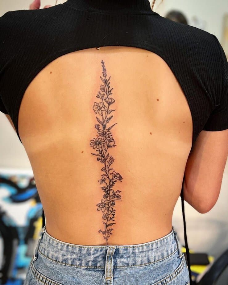 Floral vine back tattoo