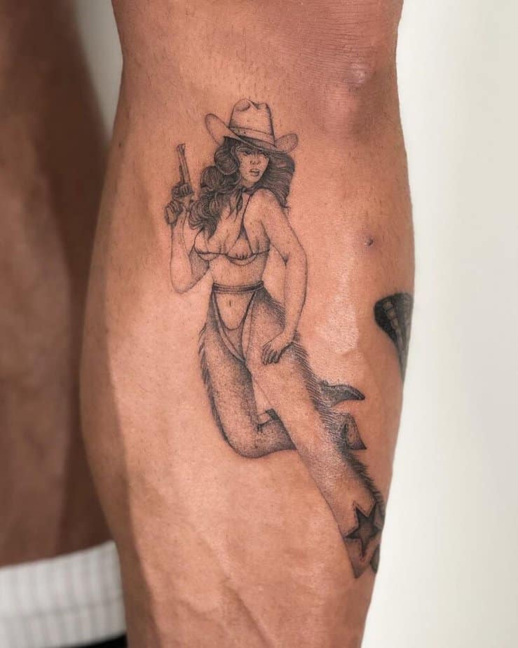 16. A tattoo of a cowgirl