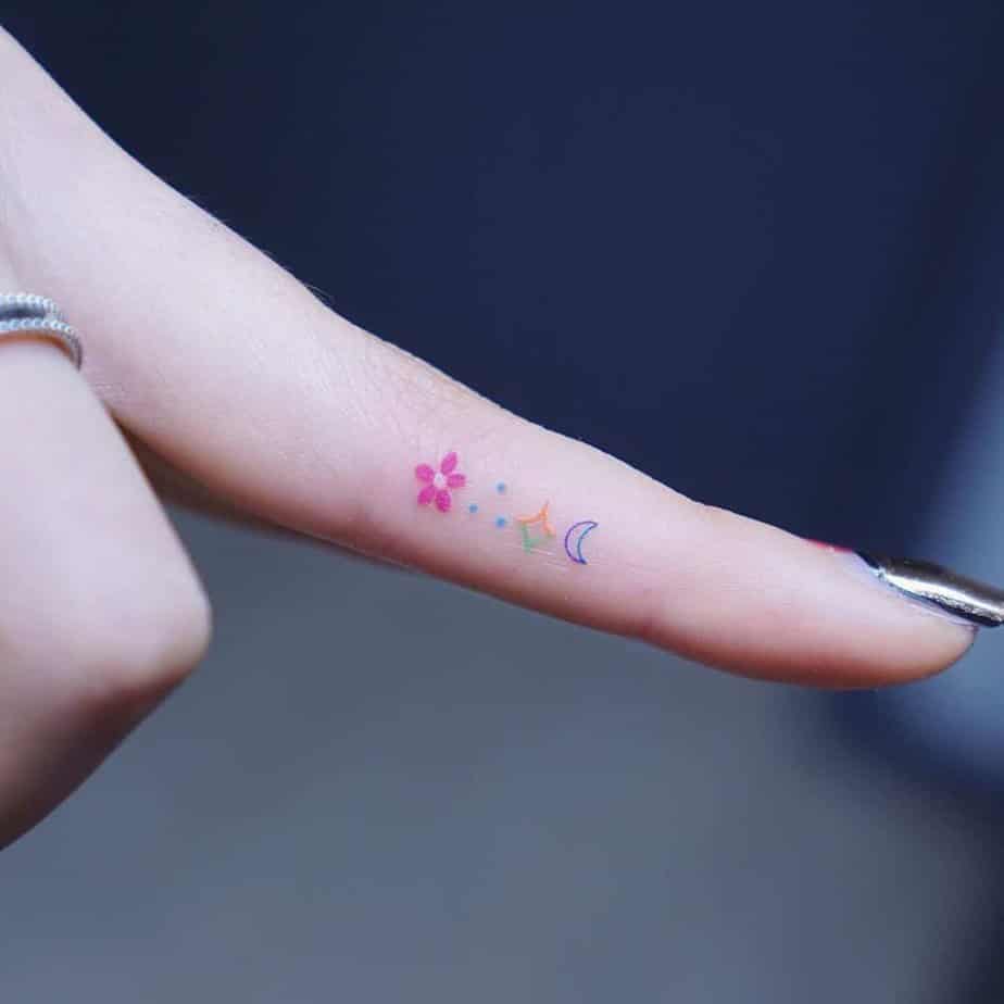 6. A cute, colorful finger tattoo
