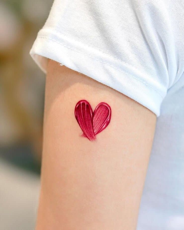 13. A heart brush stroke tattoo