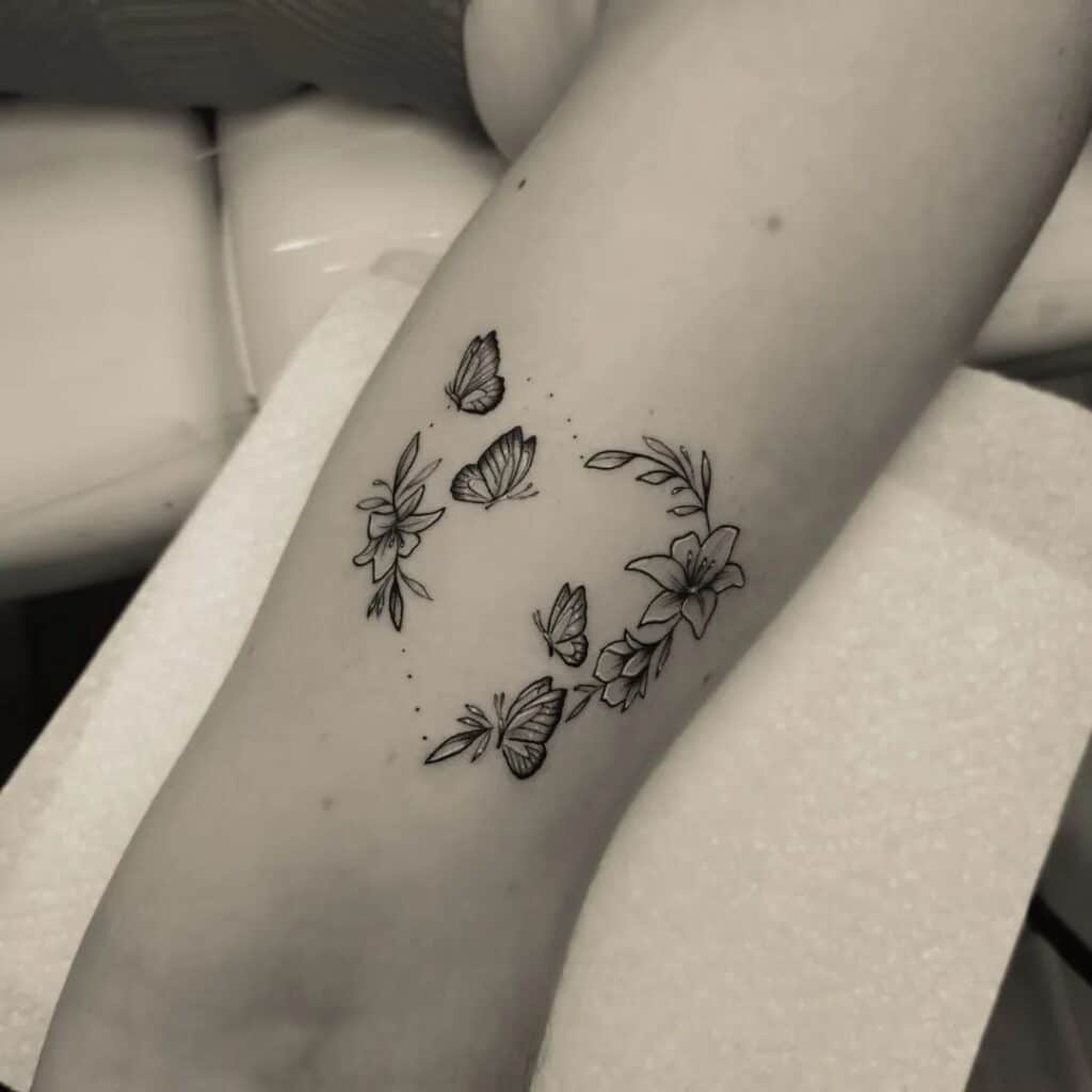 23. A butterfly heart tattoo 