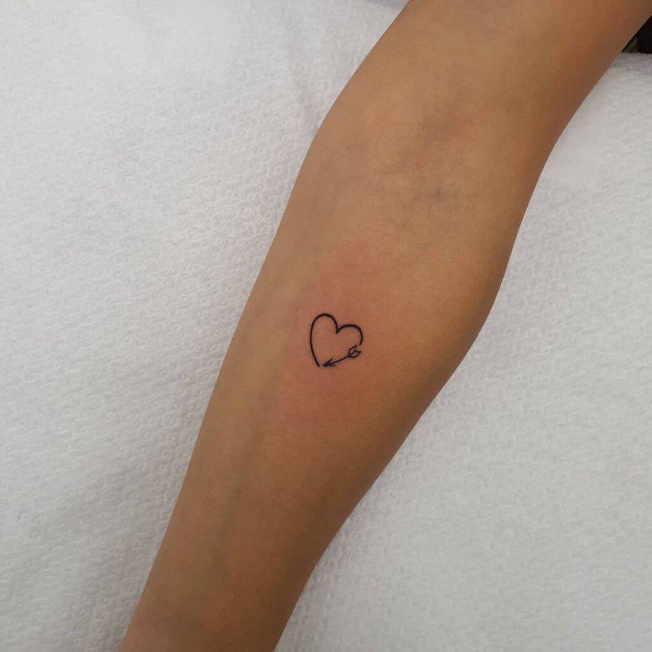 24. A heart tattoo with an arrow