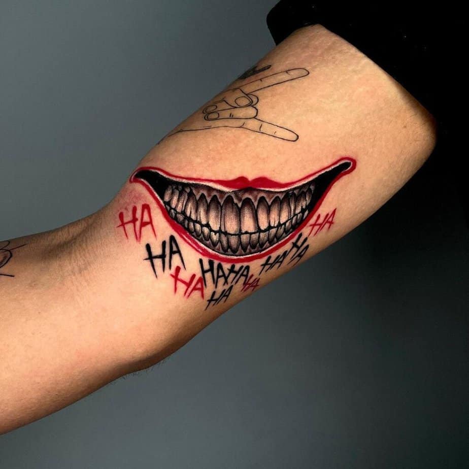 21. A Joker’s smile tattoo on the inside of the arm