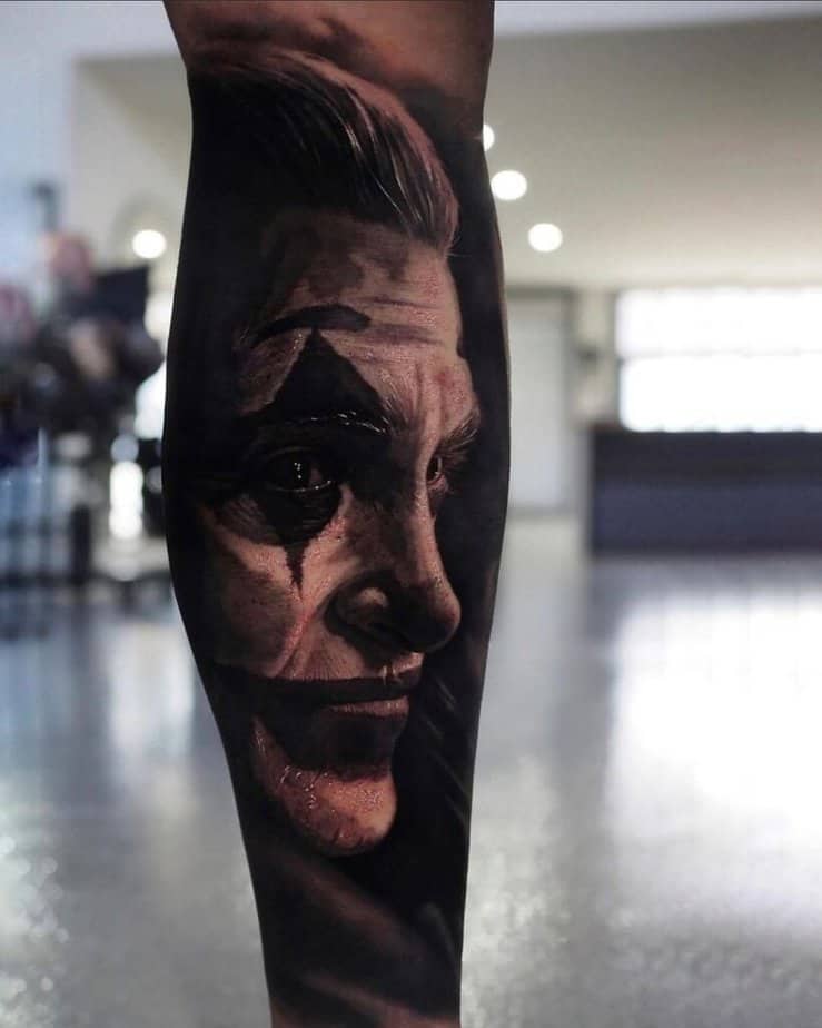 6. A Joker tattoo on the back of the leg