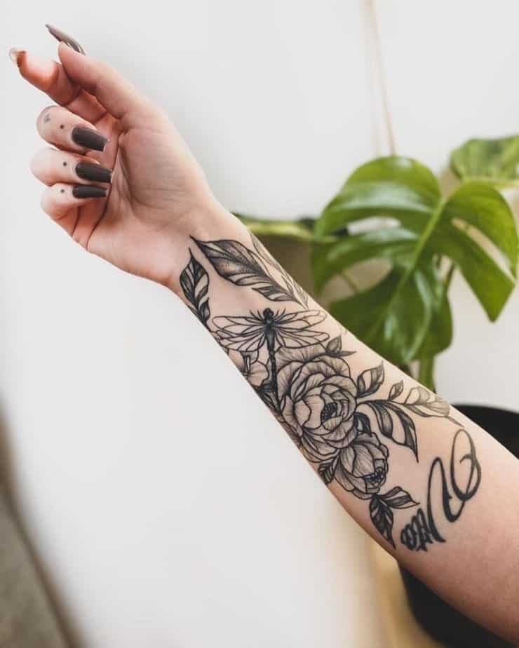 Half-sleeve floral tattoo