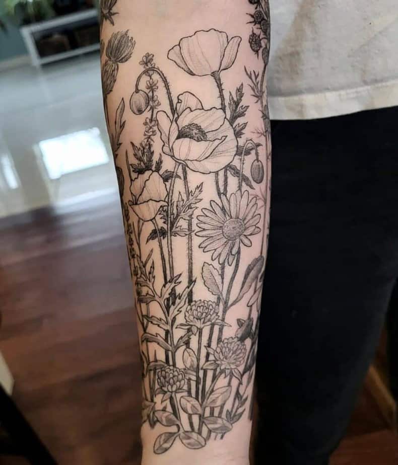 Half-sleeve floral tattoo