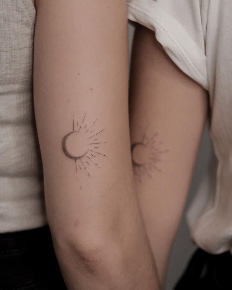 Matching sun and moon tattoos