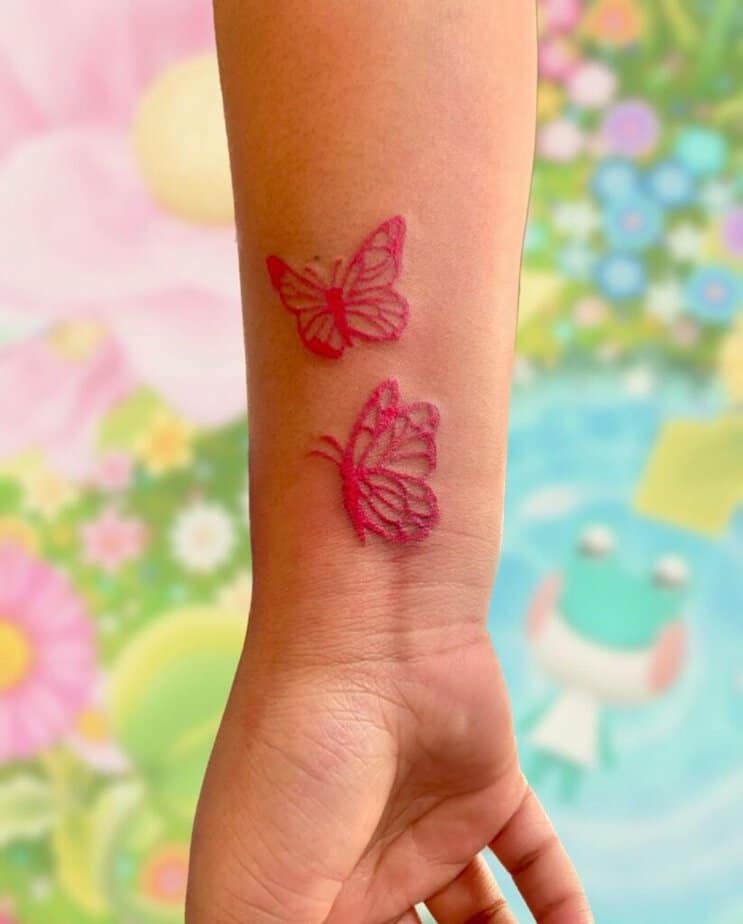 13. A tattoo of two butterflies on the wrist