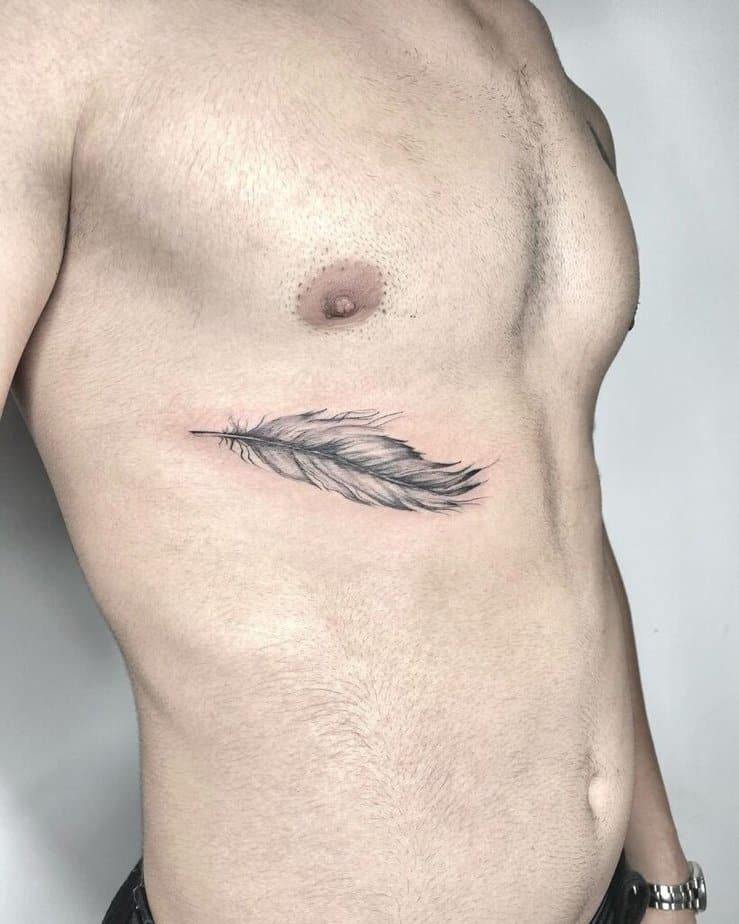 15. A feather tattoo on the ribcage