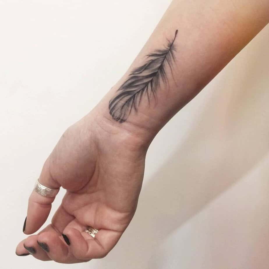 22. A feather tattoo on the wrist 