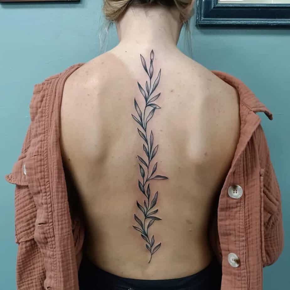Simple vine back tattoo