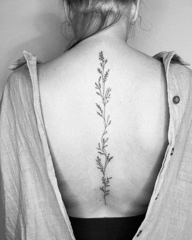 Simple vine back tattoo