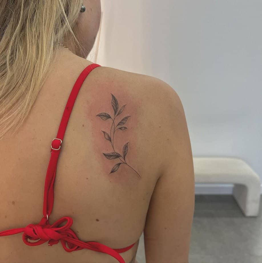 Small and dainty vine back tattoos