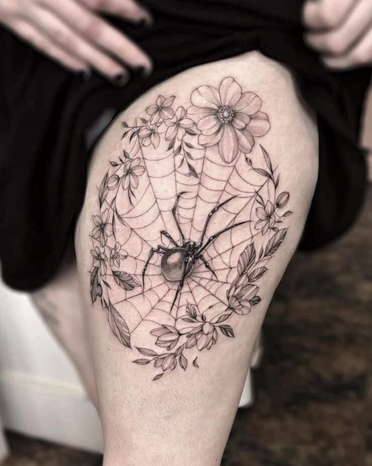 4. Spider web with floral details
