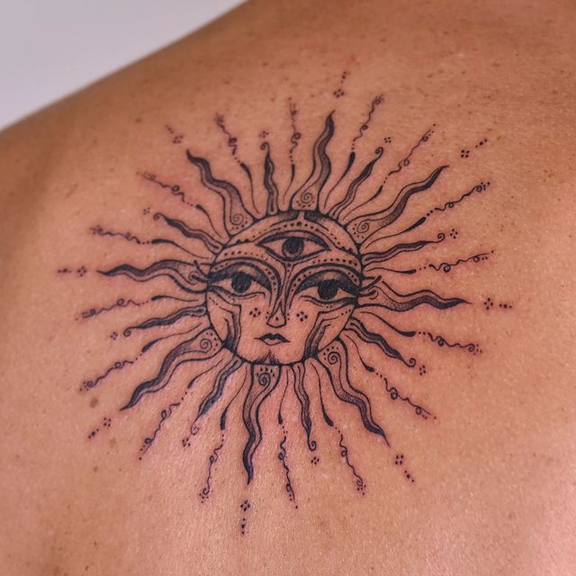 Spiritual sun tattoo