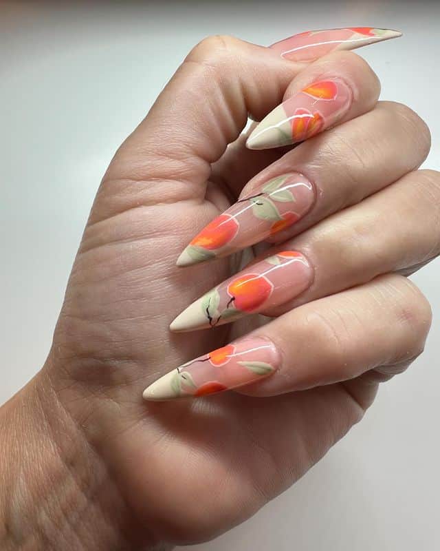 Stiletto peach nails