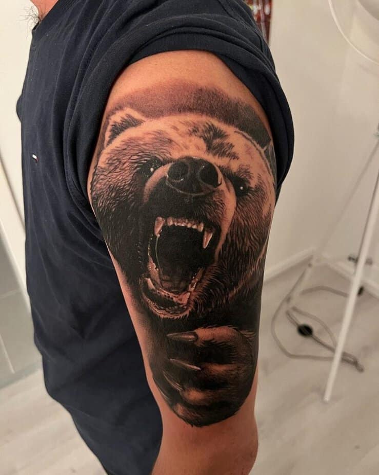 1. A roaring bear on the upper arm