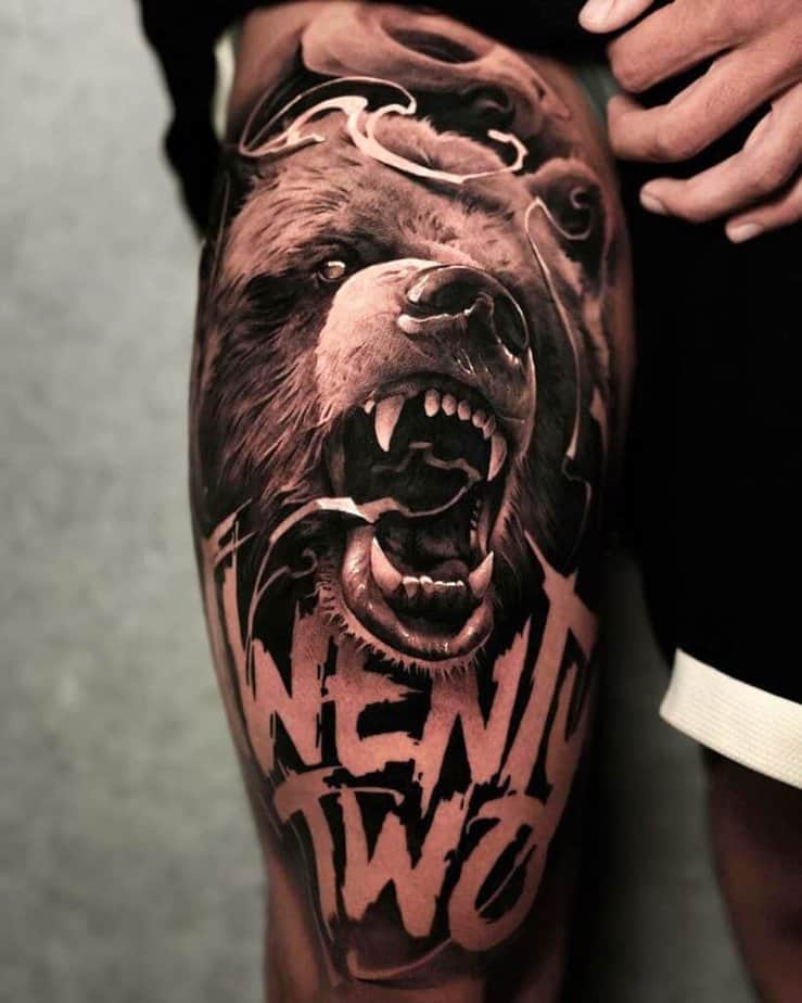 2. A roaring bear on the thigh