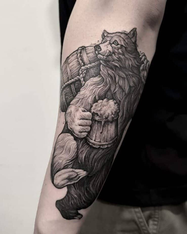 20. A bear drinking a bear on the forearm
