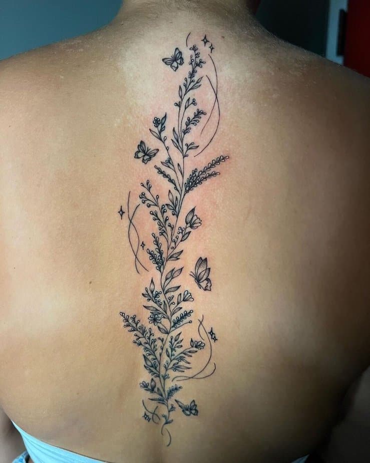 Vine back tattoo with butterflies
