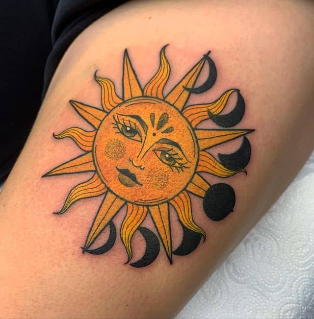 Yellow sun tattoo