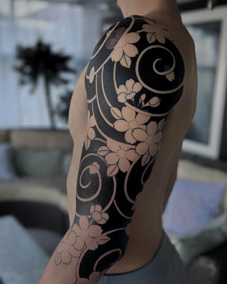 Full-sleeve cherry blossom tattoos