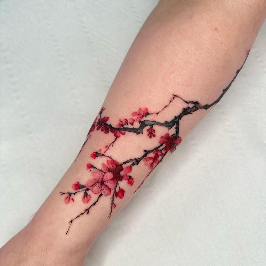 Pretty n’ pink cherry blossom tattoos